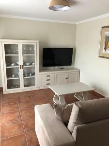 Televízia a/alebo spoločenská miestnosť v ubytovaní Casa Picual, Mancha Real, Jaén + 26 fotografií