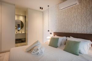 Postel nebo postele na pokoji v ubytování Blue Bay Reef apartment 19