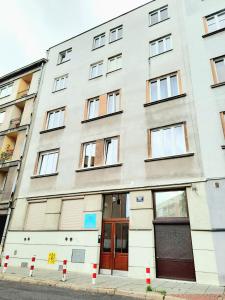 an apartment building on the corner of a street at Krakowska Awangarda - Close to the Old Town in Krakow