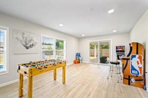 a game room with a foos ball on a table at Lagoon Retreat in Pensacola