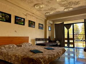 Ένα ή περισσότερα κρεβάτια σε δωμάτιο στο Smile Guesthouse
