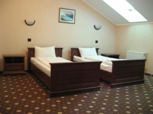 Postel nebo postele na pokoji v ubytování Shato Paradis Hotel