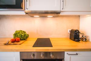 Køkken eller tekøkken på 188 Apartments - Petúnia - Pool and Balcony