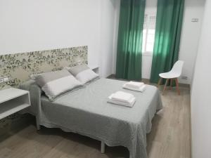 Postel nebo postele na pokoji v ubytování HORIZON