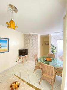 Khu vực ghế ngồi tại Lindo e aconchegante apto em Jurerê