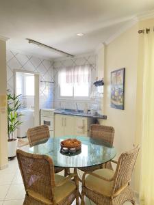 Khu vực ghế ngồi tại Lindo e aconchegante apto em Jurerê +4 ảnh