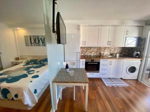Kuchyň nebo kuchyňský kout v ubytování LOFT vistas playa jardin
