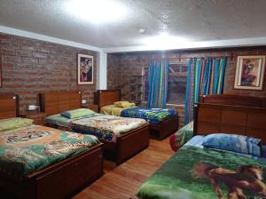 Ένα ή περισσότερα κρεβάτια σε δωμάτιο στο Hostal D´Mathias