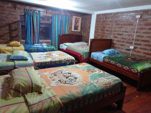 Ένα ή περισσότερα κρεβάτια σε δωμάτιο στο Hostal D´Mathias