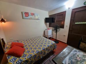 Letto o letti in una camera di Hostal Mi lugar Vintage
