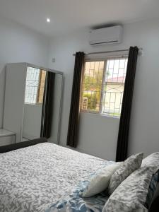 Postel nebo postele na pokoji v ubytování Belle Luxury Apartments
