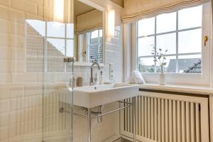 Koupelna v ubytování Sönshörn Suite + 9 fotografií