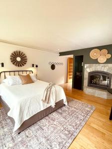 En eller flere senge i et værelse på Terra Vista Chalet