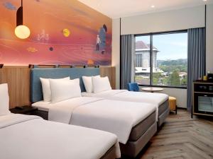 Krevet ili kreveti u jedinici u objektu ibis Styles Semarang Simpang Lima