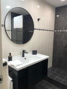 a bathroom with a sink and a mirror at Rockridge Farm 