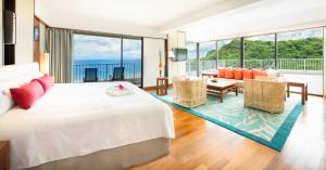 Postel nebo postele na pokoji v ubytování Hotel Nikko Guam