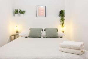 Posteľ alebo postele v izbe v ubytovaní Casa Bitibau