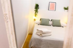 Posteľ alebo postele v izbe v ubytovaní Casa Bitibau