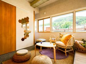 Un lugar para sentarse en Mange Tak Resort Onomichi