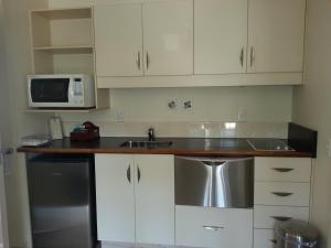 Cucina o angolo cottura di Cedar Grove Motor Lodge