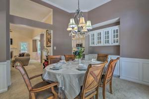 a dining room and living room with a table and chairs at Peaceful Dallas Home with Deck and Charcoal Grill in Hiram