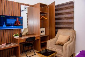 TV a/nebo společenská místnost v ubytování NIFEWAT APARTMENT,Cardiff suite 2bedroom apartment with gym ,Netflix and WiFi