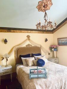 a bedroom with a large bed with a tray on it at Tracy's Boutique B&B Farmstay in Wellsford