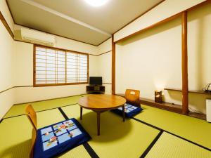 Uma área de estar em Ureshino Onsen Kotobukiya