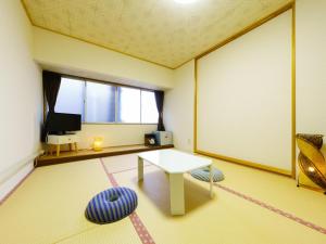 Uma televisão e/ou sistema de entretenimento em Ureshino Onsen Kotobukiya