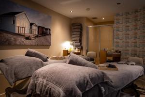 Cama ou camas em um quarto em Captain's Club Hotel & Spa