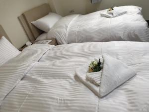 金門民宿 x 花藝雅築 The Flower Hut客房内的一张或多张床位