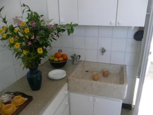Virtuvė arba virtuvėlė apgyvendinimo įstaigoje Casale Due Palme