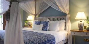 Letto o letti in una camera di Maniumpathy Hotel