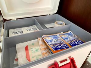 a drawer of a refrigerator filled with different types of cheese at Ma Baan House by the sea in Cha Am Beach