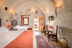 Postel nebo postele na pokoji v ubytování HacıAşık Konağı Butik Hotel