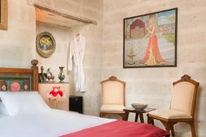 Postel nebo postele na pokoji v ubytování HacıAşık Konağı Butik Hotel