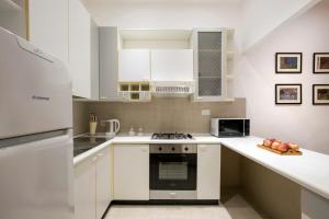 Kuchnia lub aneks kuchenny w obiekcie Cozy Loft @ Monti