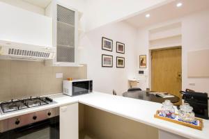 Kuchnia lub aneks kuchenny w obiekcie Cozy Loft @ Monti