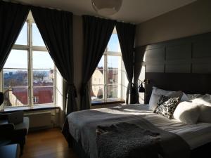 Postel nebo postele na pokoji v ubytování Clarion Hotel Wisby