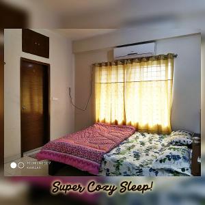 Una cama o camas en una habitación de Lake View Uttara Secured Peaceful AC Near Airport with Free Lift + Car Parking