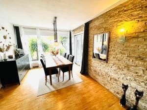 O zonă de relaxare la Exclusive High-quality Apartment Spessart +19 fotografii