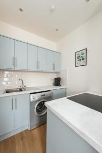 Virtuvė arba virtuvėlė apgyvendinimo įstaigoje Lovely 1-bedroom apartment in Edinburgh