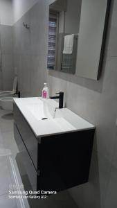 Kúpeľňa v ubytovaní P&P Central Apartment