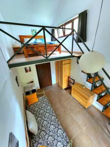 an overhead view of a room with bunk beds at House & Yard Sesil XL 90m to beach in Ureki