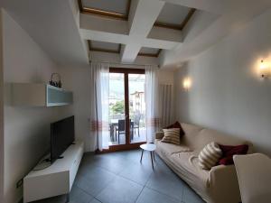 Телевизор и/или развлекательный центр в Garda Terme