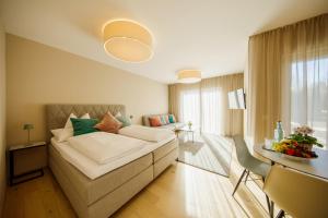Posteľ alebo postele v izbe v ubytovaní Pfeiler's Bürgerstüberl - Hotel + 37 fotografií