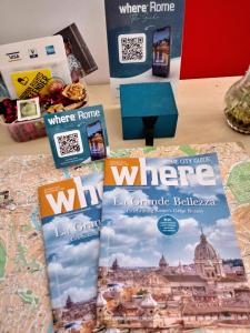 a table with pamphlets and magazines on it at Ulysses in Rome in Rome