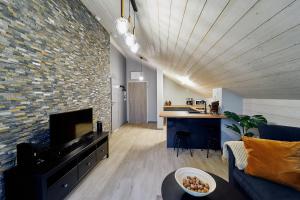 Televízia a/alebo spoločenská miestnosť v ubytovaní LAGUNA Apartament Polanica Residence 57