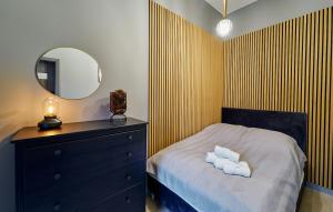 Posteľ alebo postele v izbe v ubytovaní LAGUNA Apartament Polanica Residence 57
