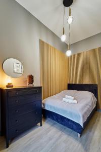 Posteľ alebo postele v izbe v ubytovaní LAGUNA Apartament Polanica Residence 57
